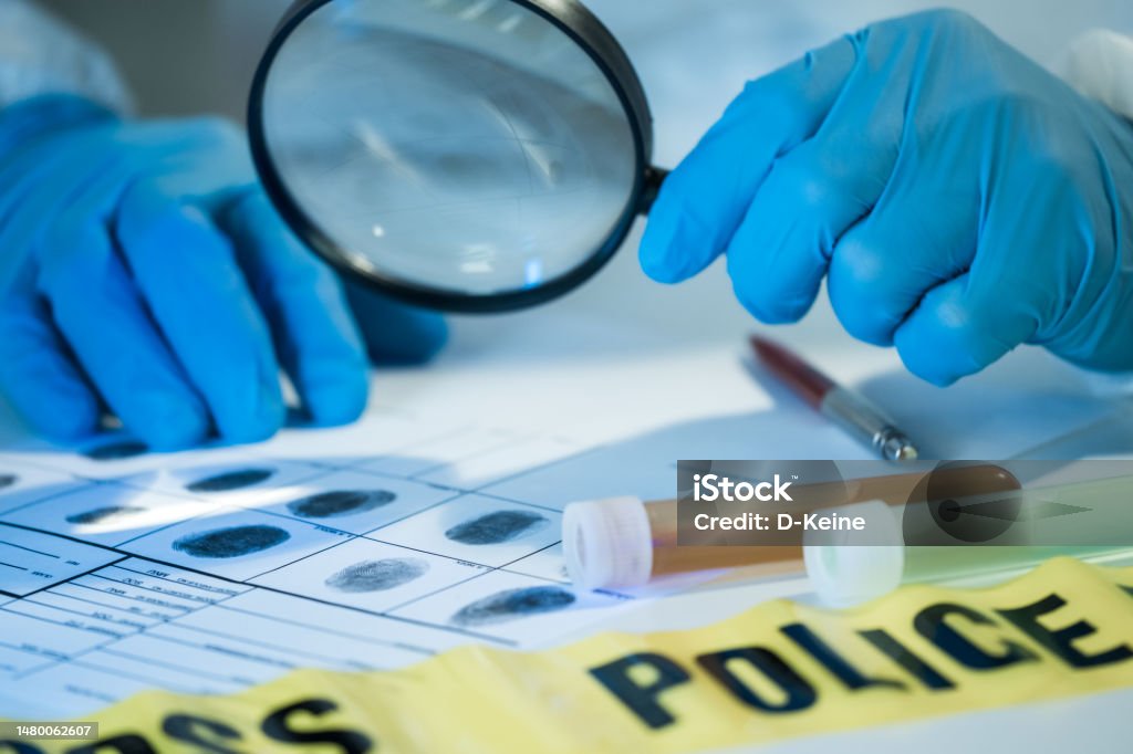 Forensic science Senior forensic scientist working in laboratory Police Force Stock Photo Forensic science Senior forensic scientist working in laboratory Police Force Stock Photo
