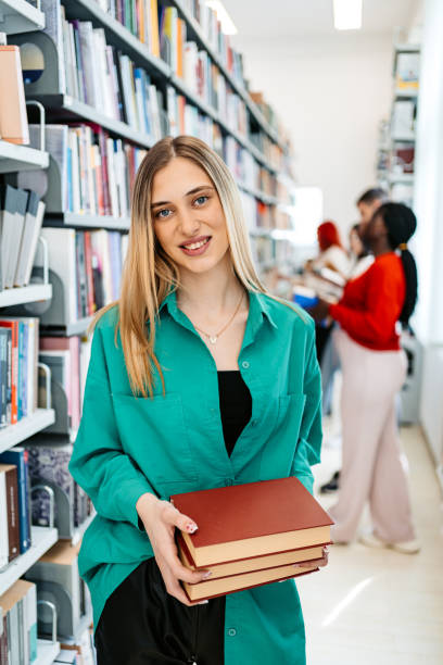 istock Young Female Student In A School Library 1480066957