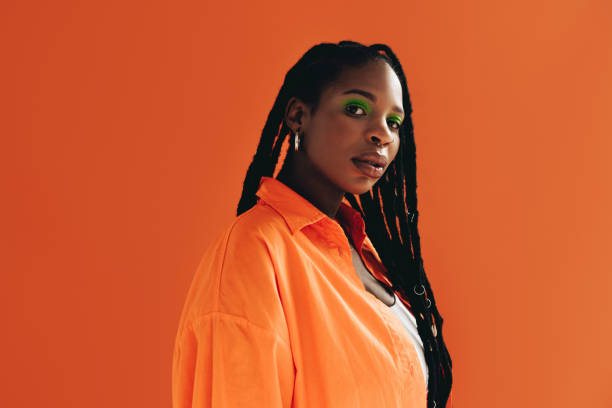 istock Black woman with makeup standing in a studio 1480069056