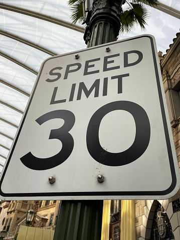 Stock photo showing close-up view of 'Speed Limit 30' sign.