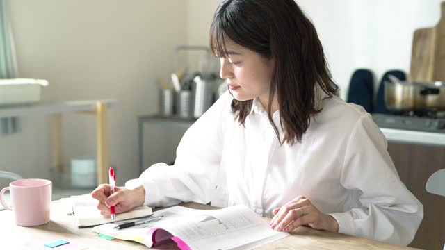 Adult woman studying with text