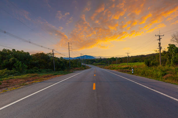 istock beautiful roads and mountains,Empty asphalt road with cloudy sky and sunlight 1480071188