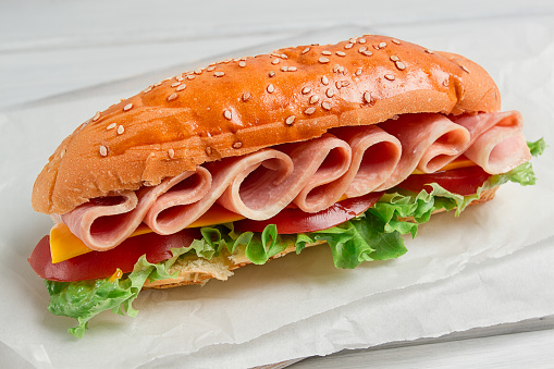Sandwich submarine, on a white table, close-up, no people, horizontal, homemade,