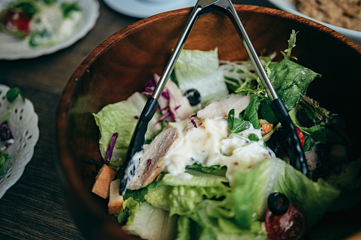 Table full of various fresh food in luxury modern restaurant