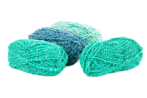 Four knitting yarn clews isolated on white background.