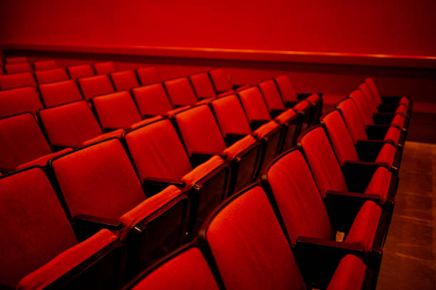 istock red auditorium with rows of empty seats 1480090771