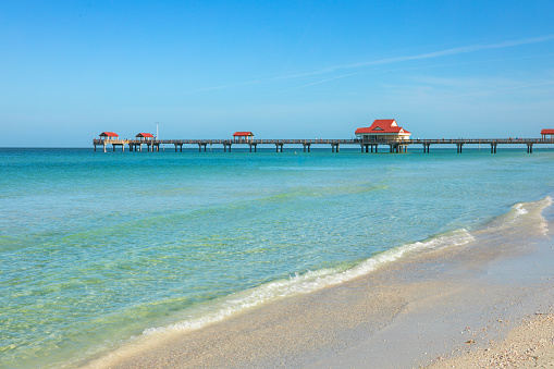 Naples Pier and beach in florida USA sunny day