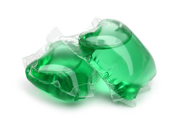 Laundry detergent pods for washing machine Laundry detergent pods for washing machine on white background detergent capsule stock pictures, royalty-free photos & images