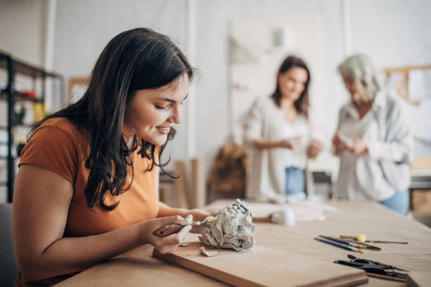 istock Teenager modeling clay 1480092837