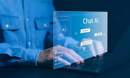 Chat AI Chat with AI or Artificial Intelligence technology. Man using a laptop computer chatting with an intelligent artificial intelligence asks for the answers he wants. Smart assistant futuristic,