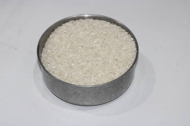 istock photo of white rice on a small iron container 1480098047