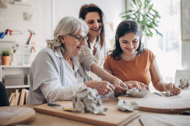istock Female siblings making clay pottery 1480099050