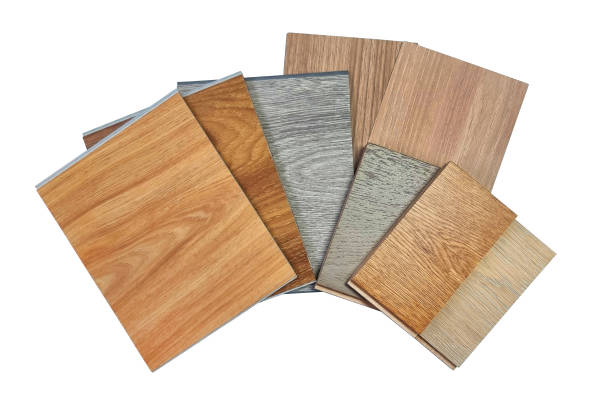 istock wooden vinyl flooring tiles, engineering flooring tiles, laminated veneers samples isolated on background with clipping path. multi texture and color of interior finishing material samples swatch. 1480101334