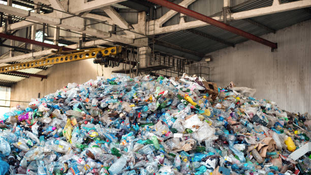 istock Heap of plastic garbage at waste sorting plant 1480105191