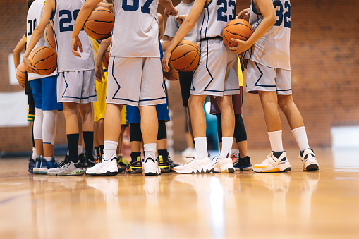 TV Broadcast Style Footage of Two International Teams Playing Basketball at a Professional Arena. Teams Dribble, Pass the Ball, Sucessfuly Score Goals During an Intense World Championship Match.