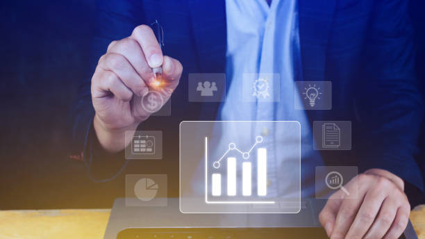 istock Big data analytics and business intelligence BI concept with chart and graph icons on digital screen interface and business people in the background. 1480105679