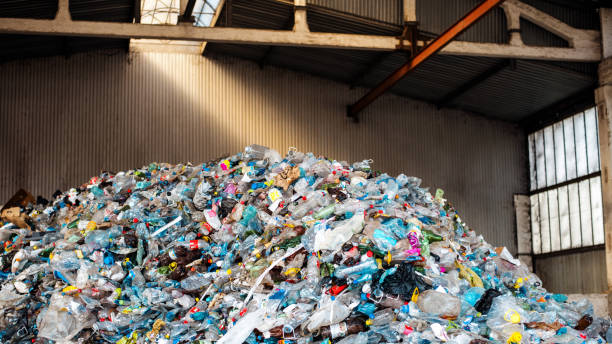 istock Heap of plastic garbage at waste sorting plant 1480106516