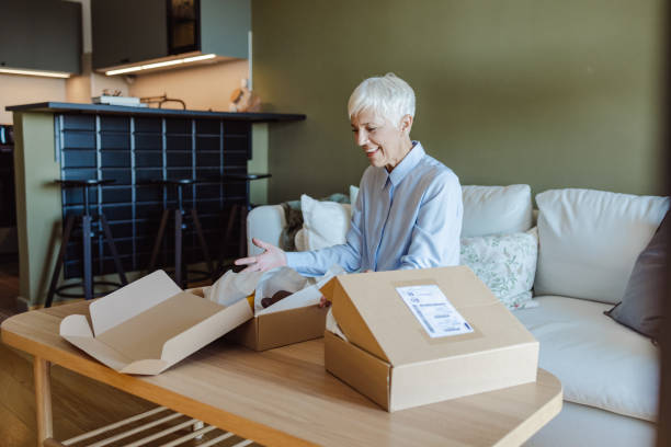 istock Senior woman received an online order 1480108745