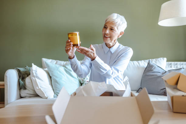istock Senior woman received order from an online store 1480109444