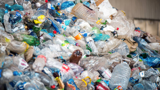 istock Heap of plastic garbage at waste sorting plant 1480109600