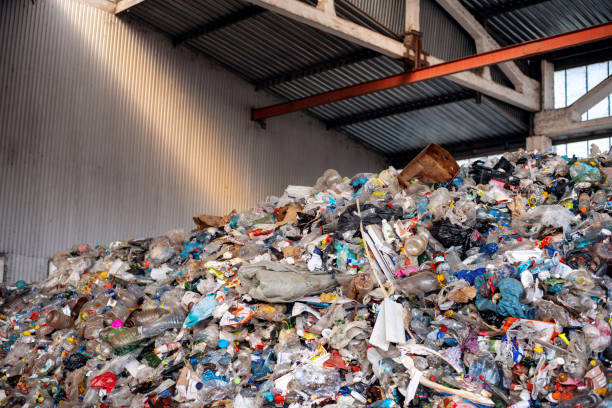 istock Heap of plastic garbage at waste sorting plant 1480109931