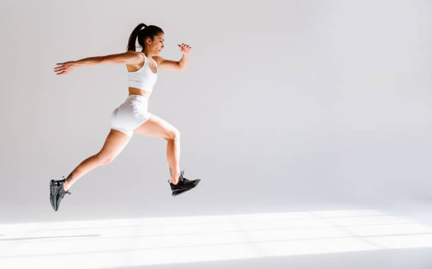 istock Young female athlete training in a gym using sport equipment 1480113785