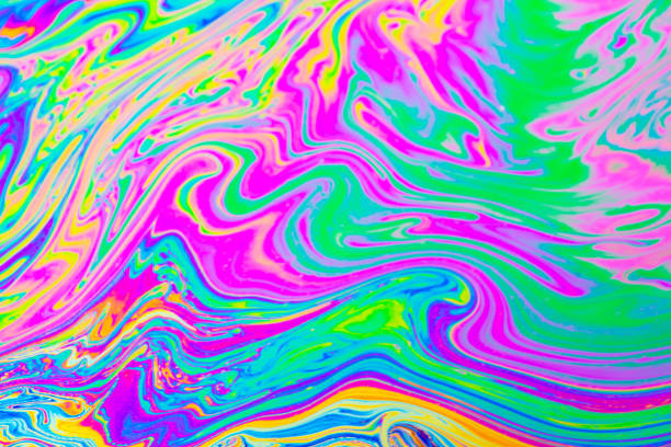 istock Psychedelic multicolored background abstract. Rainbow colors. patterns background. Photo macro shot of soap bubbles 1480122642