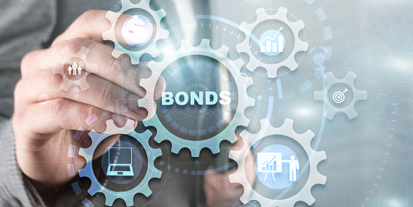 Businessman clicks inscription bonds. Bond Finance Banking Technology Gears concept.