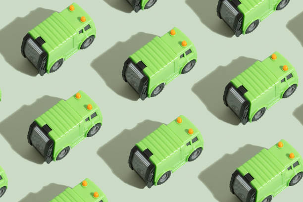 istock Patten from toy garbage truck and recycle text on a green background 1480126497