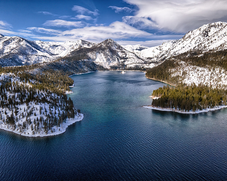 An aerial view of a sunny day above scenic Emerald Bay on Lake Tahoe, California