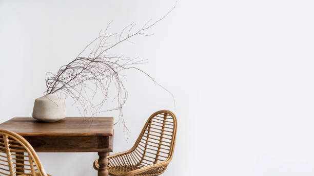 istock twigs in modern vase on wood table, still life composition 1480143237
