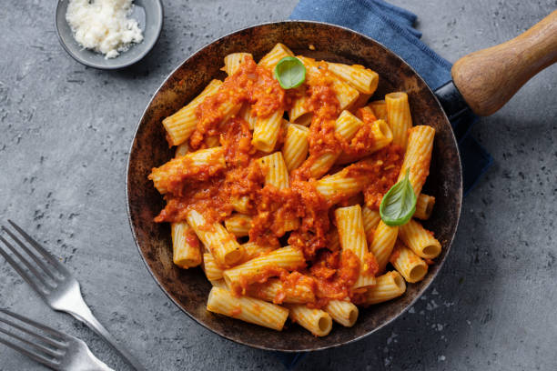 istock Pasta with tomato sauce served on pan 1480146674