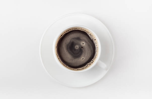 istock A white cup of coffee on a white background. 1480155312