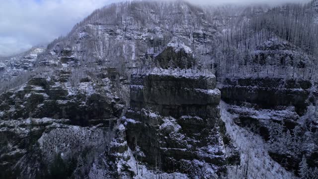 Tall Cliff Face With Snow