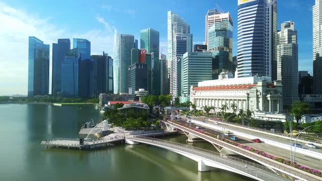 drone Singapore aerial view. Bridge to downtown. Merlion statue fountain.