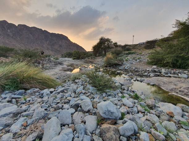 istock Stream of Water Shawkat Dam Ras Al Khaimah Mountain Ranges 1480169247