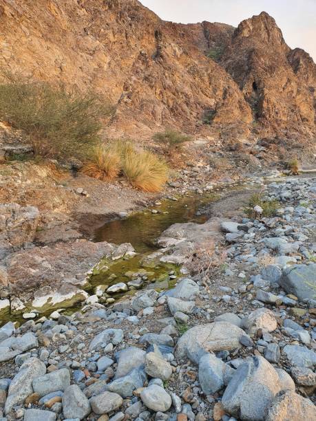istock Stream of Water Shawkat Dam Ras Al Khaimah Mountain Ranges 1480170328