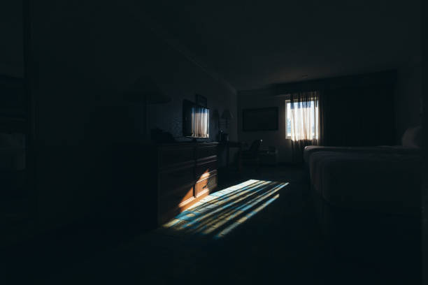 istock Dark interior of cheap roadside hotel room 1480170692