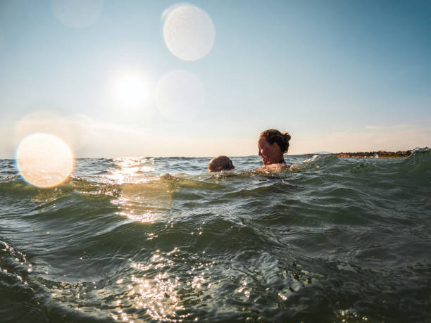 istock Beautiful Bond Between Mother And Son At The Beach 1480178085