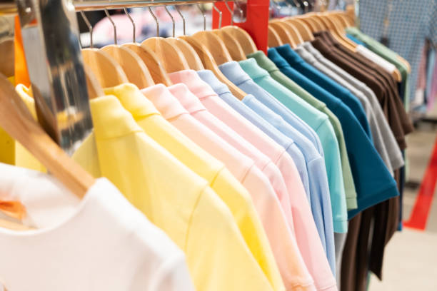 istock Cloth hanging on a rack in a store. 1480182481