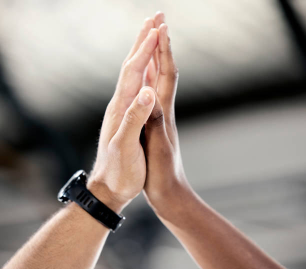 istock Fitness, team work or hands high five for success or body goals in training, workout or exercise at gym. Winner, partnership or healthy sports people with motivation or support or mission for winning 1480185145
