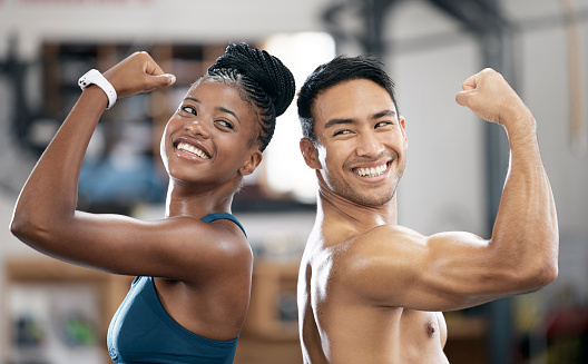 Fitness, black woman or couple of friends flexing muscles for body goals in training, workout or exercise. Coaching results, teamwork or sports athletes with strong biceps, motivation or focus at gym