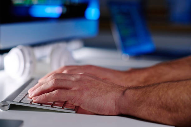 istock Focus on hands of senior IT manager pressing keys of computer keyboard 1480186848