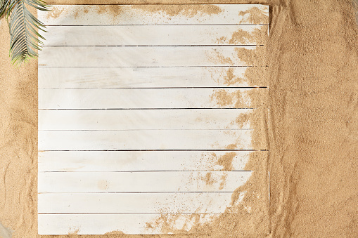 White wood background with sand