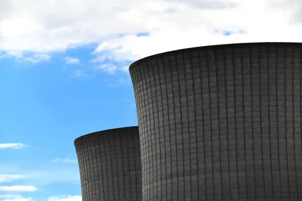 A power plant cooling tower. these type of towers are often but not always associated with nuclear power plants.