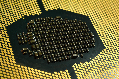 A close up of a computer CPU chip.