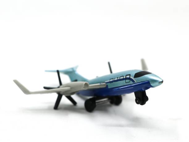a blue airplane jet toy isolated in a white background