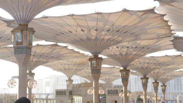 istock nabawi mosque with beautiful umbrella 1480208883