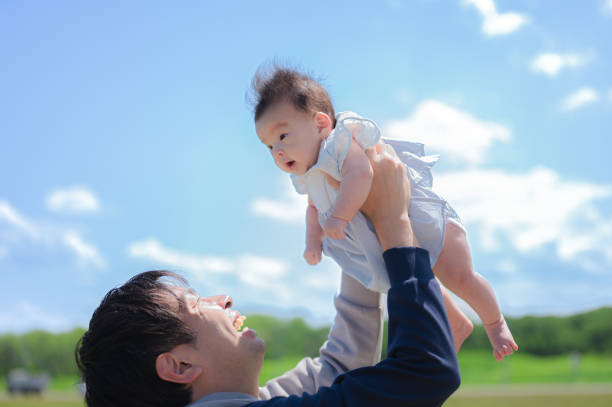istock summer vacation baby and father at sea 1480209529