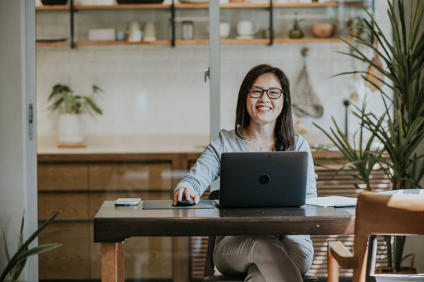 istock Happy senior manager working at home. 1480221297